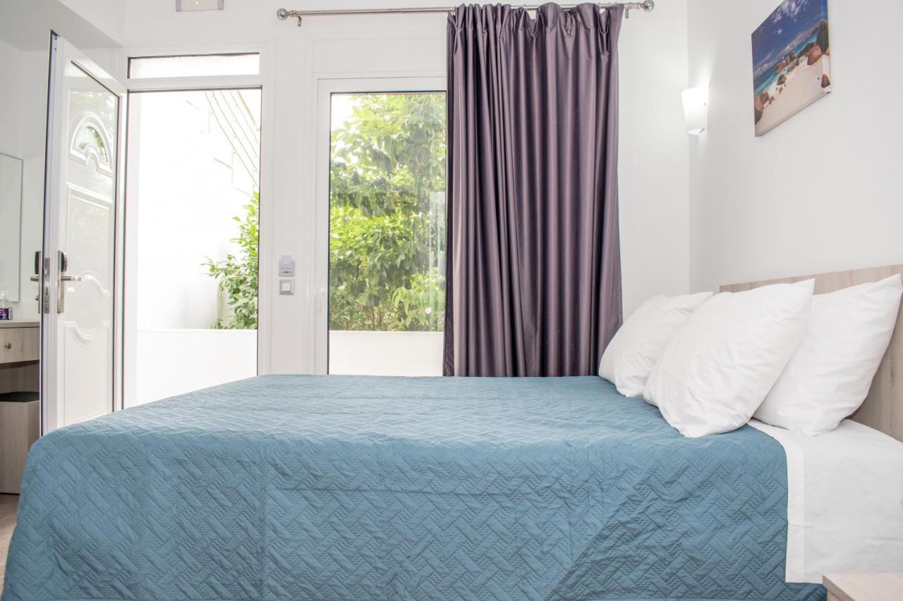 Red Hibiscus Stegna Guest House อาร์คานเยโลส ภายนอก รูปภาพ